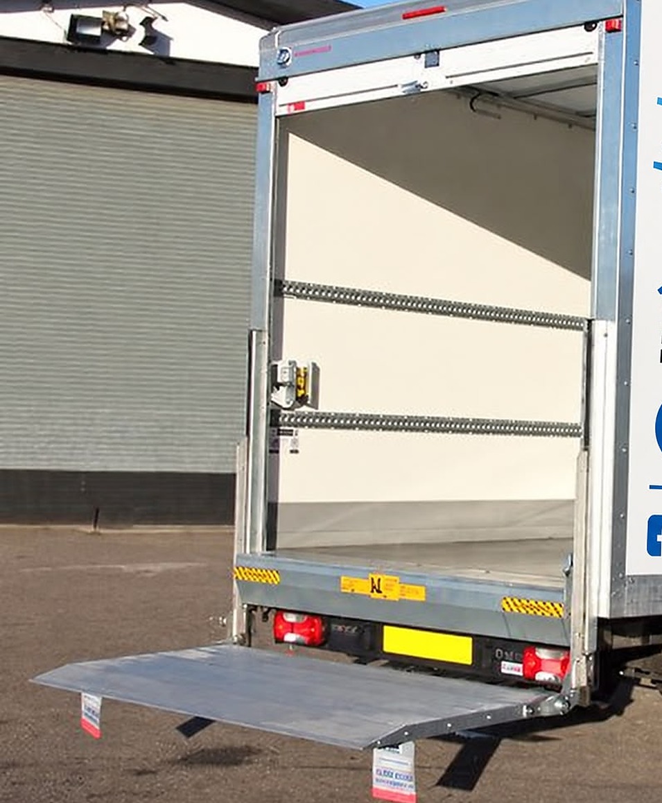 White removal van with open rear doors and hydraulic tail lift